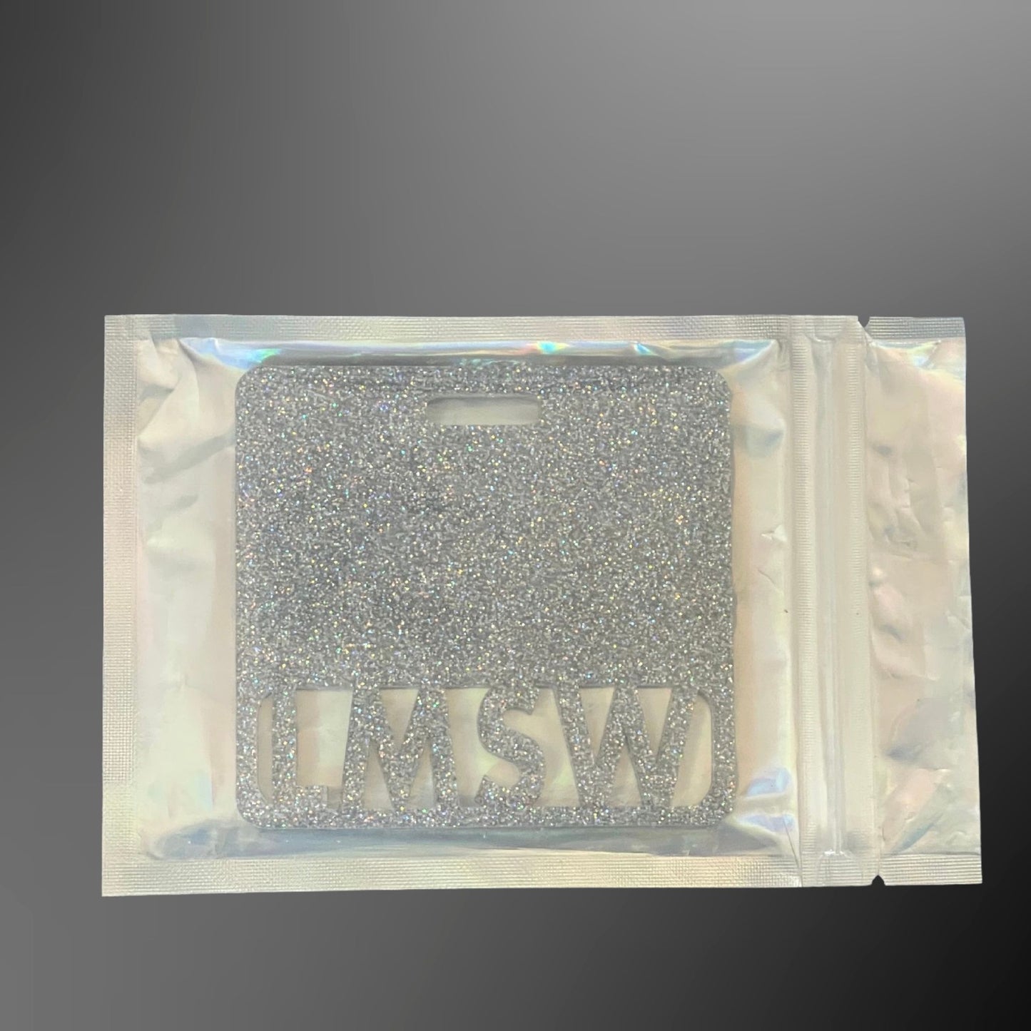 Silver glittery LMSW badge mate