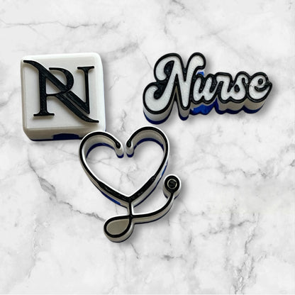 Decorative straw toppers for nurses on a marble background