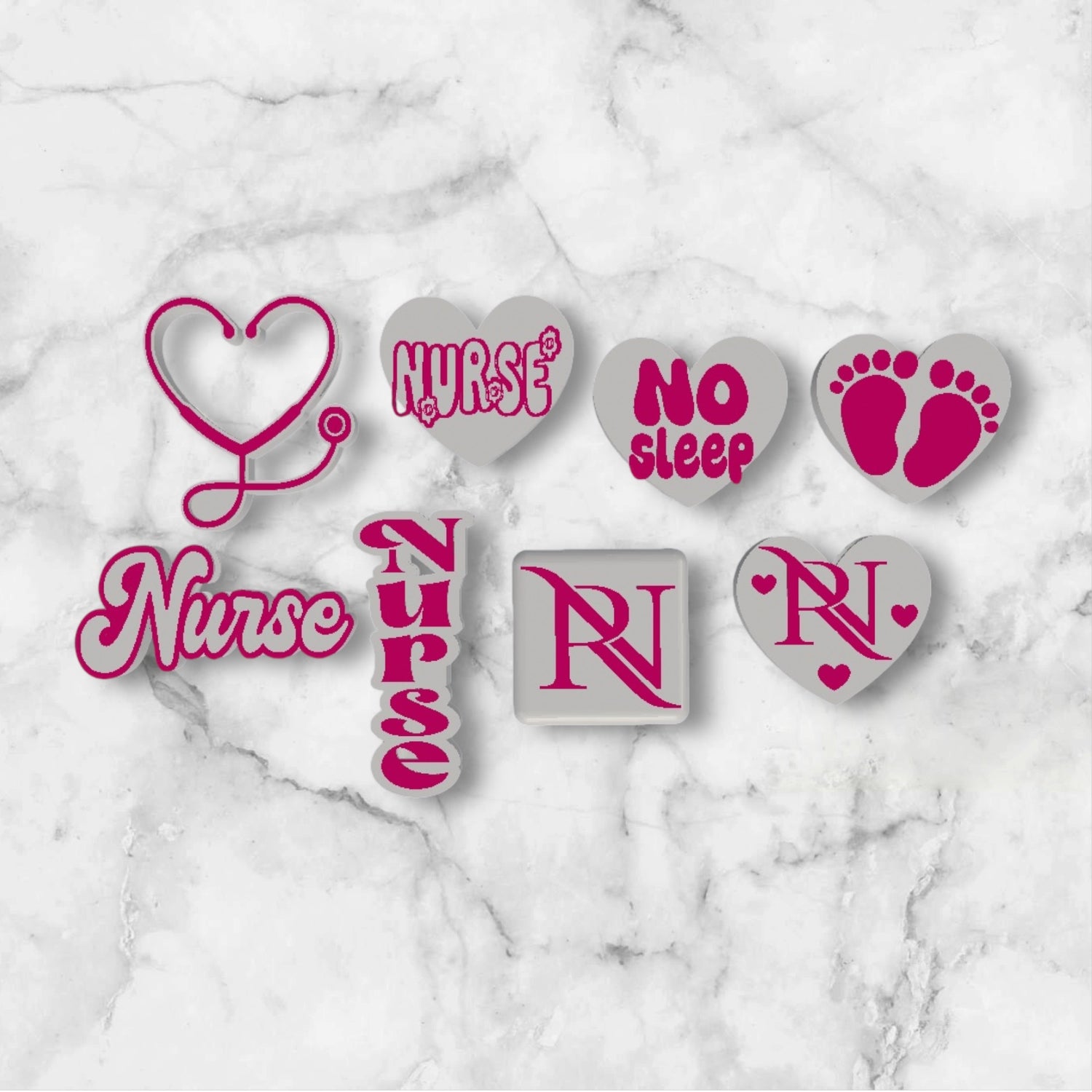 Set of heart-shaped and rectangular Nurse-themed 3D printed straw topper on a marble background