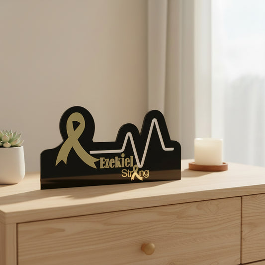 A neon sign featuring a yellow ribbon symbol and the phrase 'Ezekiel Strong' on a decorative background.