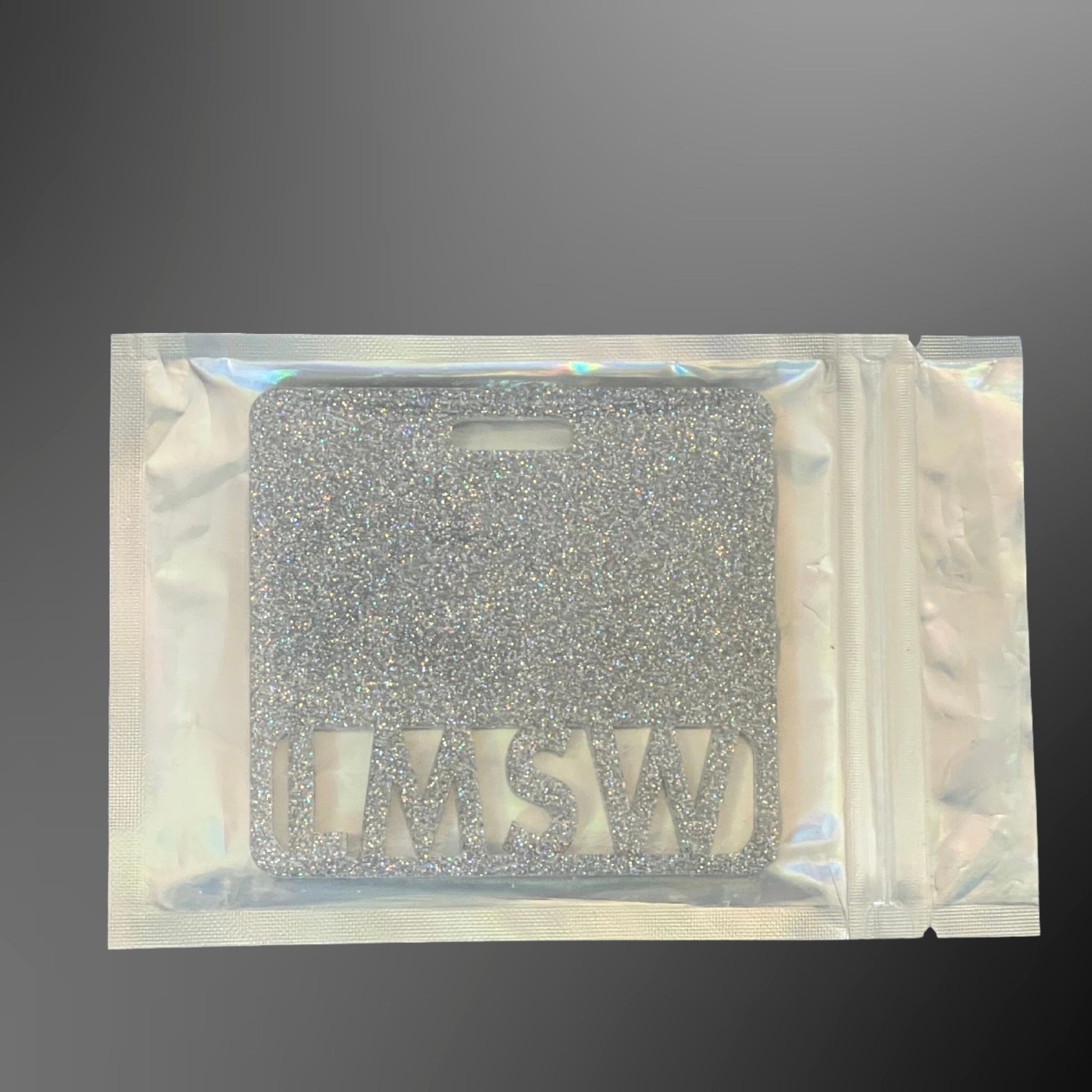 Silver glittery LMSW badge mate 