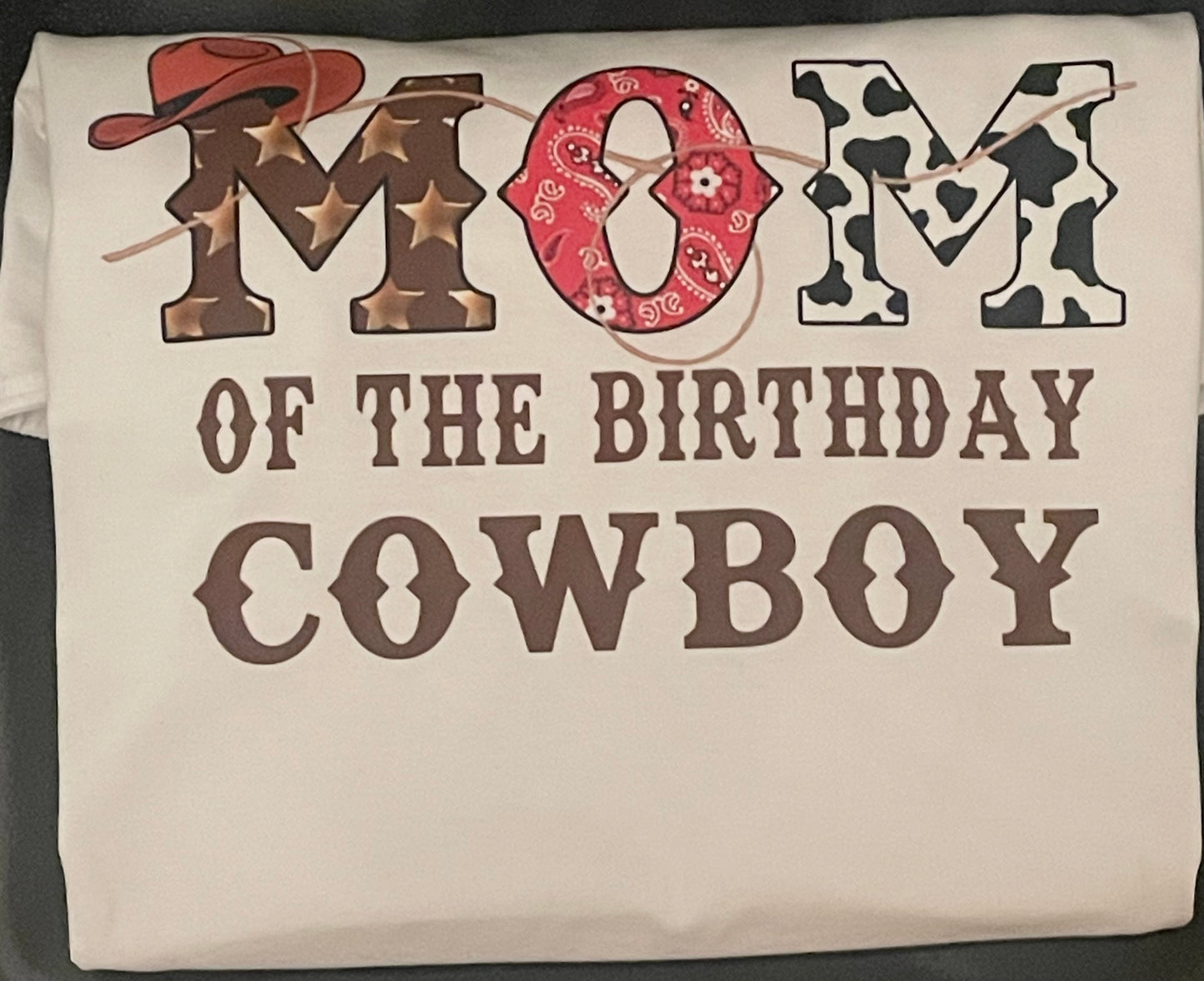 Cowboy-themed decorative shirt with 'Mom of the Birthday Cowboy' text.