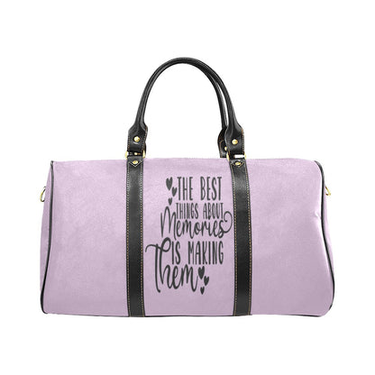 A custom tote bag in purple color with a text pattern on the front, featuring a black handle and an adjustable shoulder carry strap.