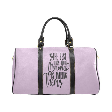 A custom tote bag in purple color with a text pattern on the front, featuring a black handle and an adjustable shoulder carry strap.