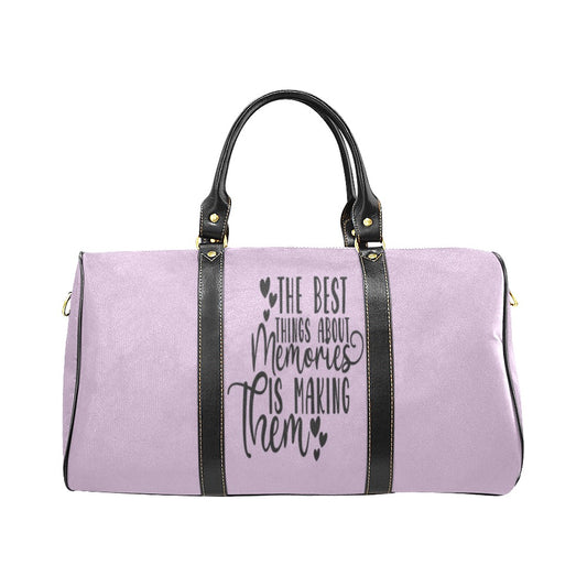 A custom tote bag in purple color with a text pattern on the front, featuring a black handle and an adjustable shoulder carry strap.